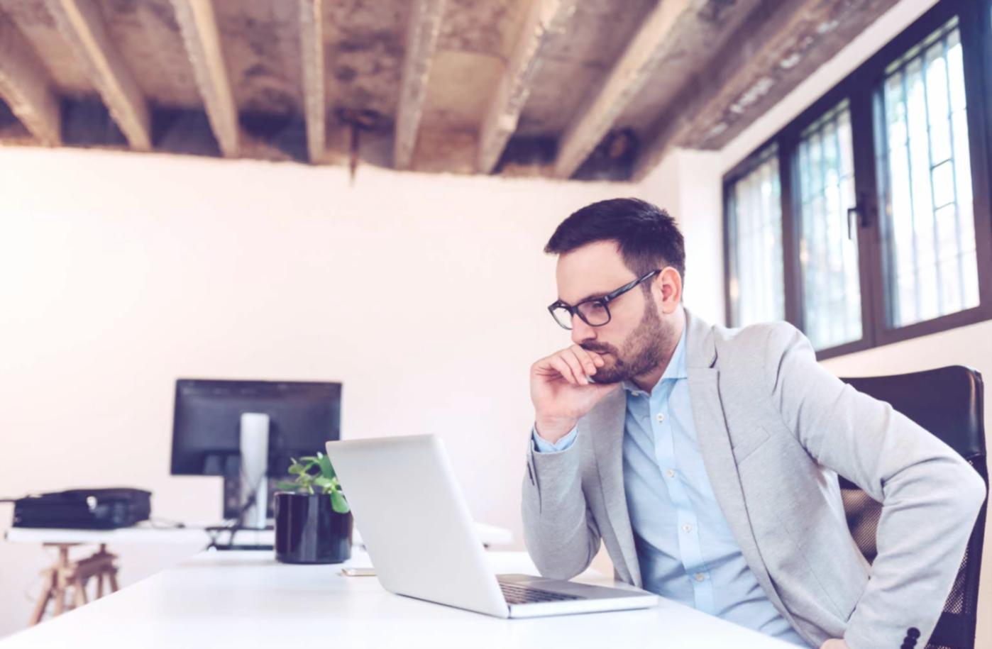 Financial professional reviewing capital budgeting project analysis with investment evaluation metrics