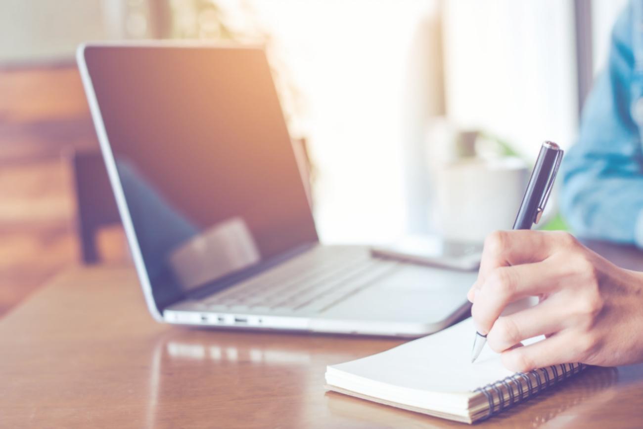 Financial analysis workspace showing capital budgeting documentation and strategic planning materials
